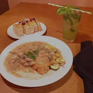 Chef special Champagne Mushroom Chicken entree with house made focaccia and Tuscan Mojito.