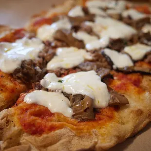 "Salsiccia and porcini" - San Marzano tomatoes, house made Italian saussage, porcini mushrooms, fresh mozzarella