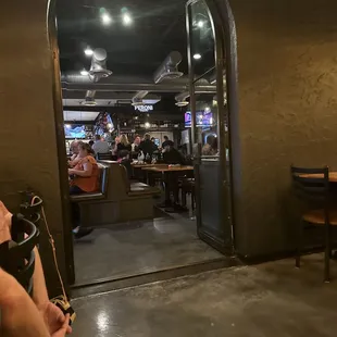 a view of a restaurant through a doorway