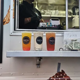 a man behind a food truck