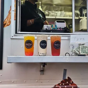 a man behind a food truck