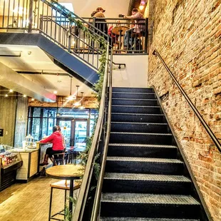 a staircase leading to a restaurant