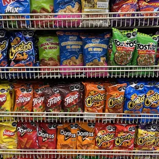 a display of chips and other snacks