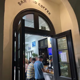 people sitting at the bar