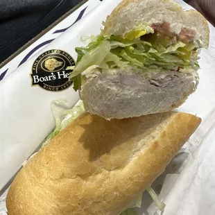 a sandwich with lettuce and meat