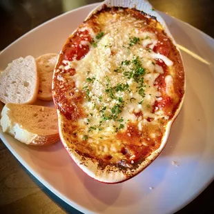 Salsiccia Manicotti... pasta stuffed with italian sausage, blend of italian cheeses, basil, and garlic, baked in house marinara.