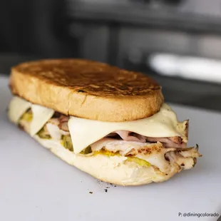 a sandwich on a cutting board