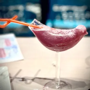 DISCO BIRD $14 Cutwater Vodka, Fresh Lemon Juice, Blueberry, Lemonade, glitter.