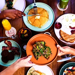 a table full of food and drinks