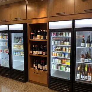 a row of bottles of wine in a store