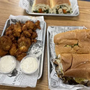 Buffalo cauliflower (vegan cauliflower wings), Cubano and Grilled Chicken and Rabe.