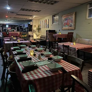 a restaurant with tables and benches