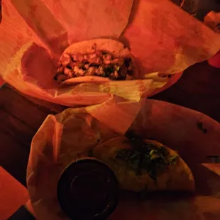 two tacos on a table