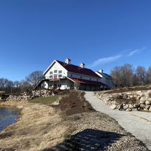 a white house with a red roof
