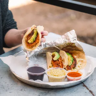 a person eating a burrito