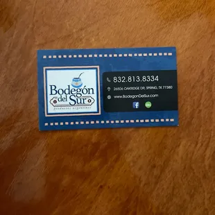 a business card on a table