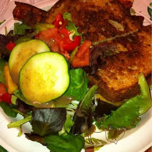 Grilled cheese with bacon and a side of salad