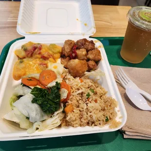orange gardein chicken and curried potato with fried rice and mixed veggies