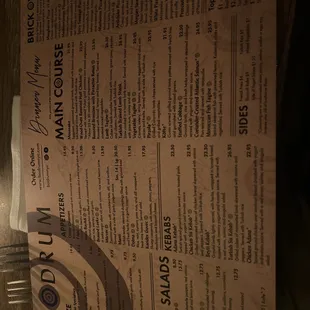 a menu for a restaurant on a table