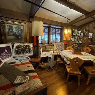 a living room filled with antiques