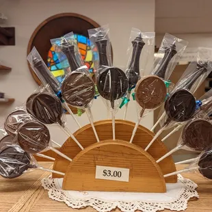 a display of chocolate lollipops