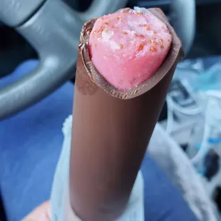 Chocolate-dipped strawberry popsicle