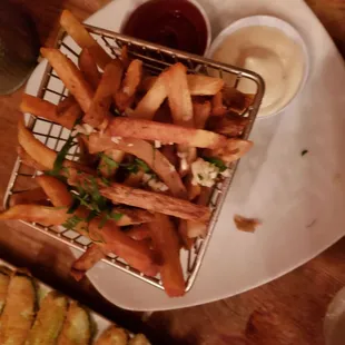a basket of french fries and french fries