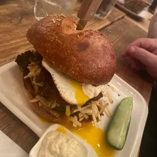 a plate of food and a pickle