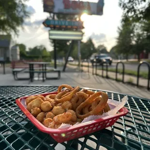 a basket of onion rings
