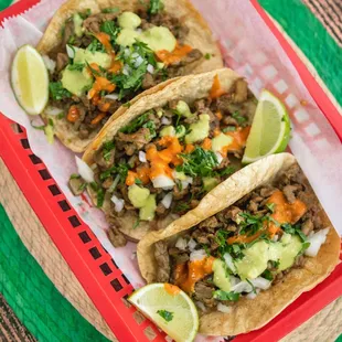 three tacos in a basket