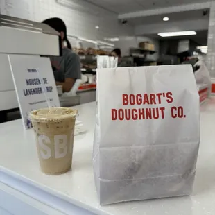 Iced latte and to go bag with donuts!!!
