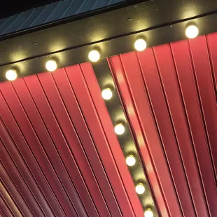a red ceiling with lights