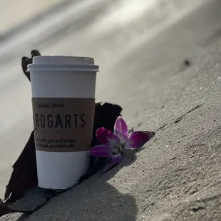 a cup of coffee on the beach