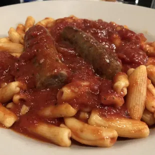 a plate of pasta and meatballs