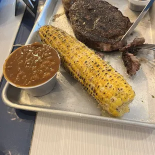 Steak, corn, baked beans