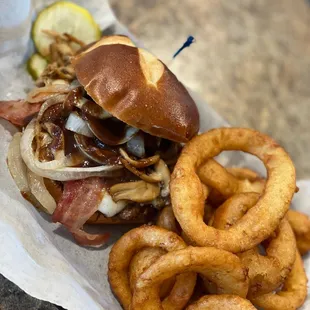 a sandwich and onion rings