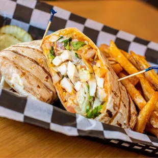 a chicken wrap and fries