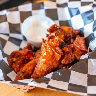 a basket of chicken wings