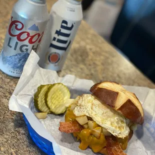 a bacon, egg, and pickle sandwich