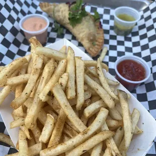 Our 2nd order of fries (smh) and oxtail empanada