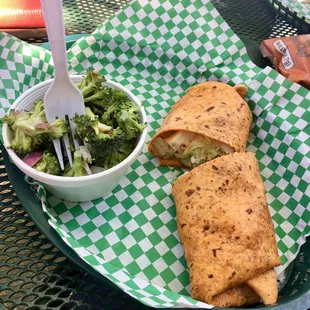 Cajun chicken wrap with a side of broccoli salad
