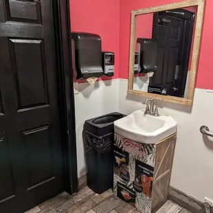 a sink and mirror in a bathroom