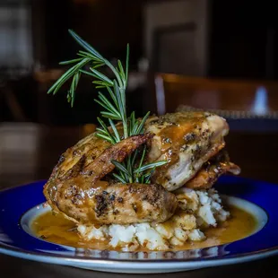 a plate of food with meat and mashed potatoes