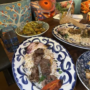 plates of food on a wooden table