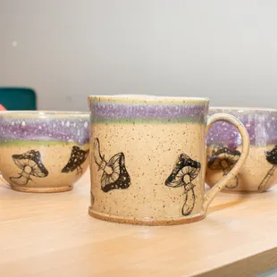 three coffee mugs on a table