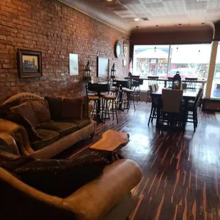a view of a living room and dining area