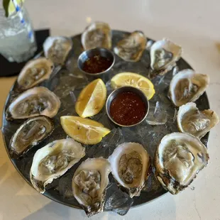 A dozen steamed oysters