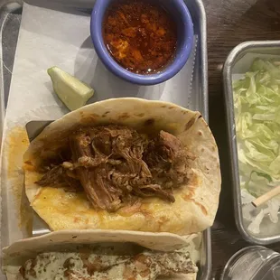 Crispy chicken taco and birria barbacao taco