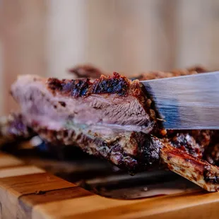 a piece of meat on a cutting board