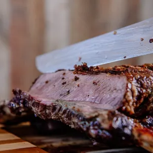 a piece of meat on a cutting board